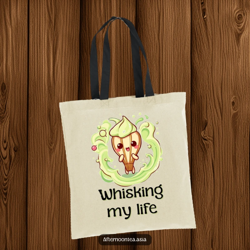 Funny Kawaii Matcha Whisk Tote Bag: A cute character creating frothy patterns, perfect for shopping and as a funny gift.